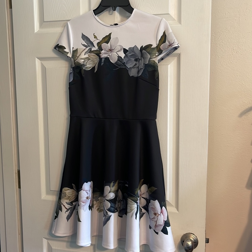 Ted Baker (international size 2) fits a U.S. 6 Black, floral dress